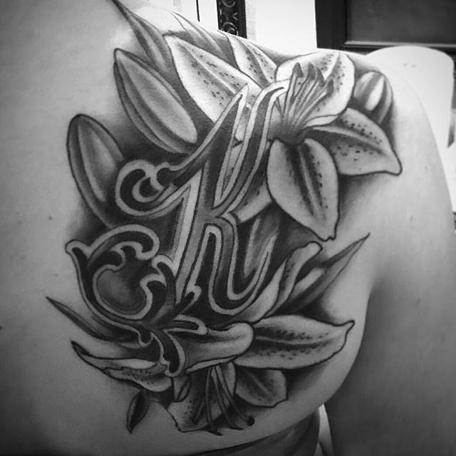 Stargazer Lilly Shoulder Tattoo - Remington Tattoo Parlor