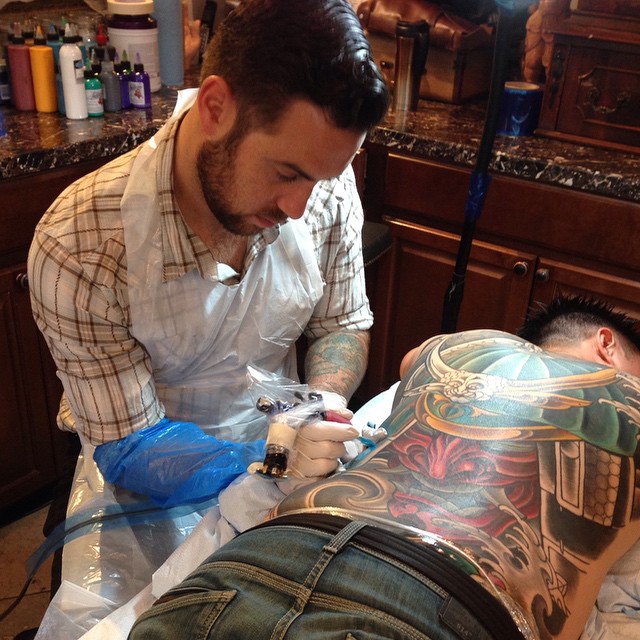 Terry Ribera @terryribera in action at Remington Tattoo #remingtontattoo #backpiece #wip
