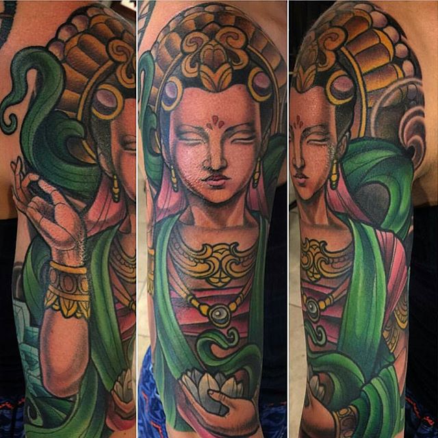 Full Color Guanyin Upper Arm Tattoo by Terry Ribera