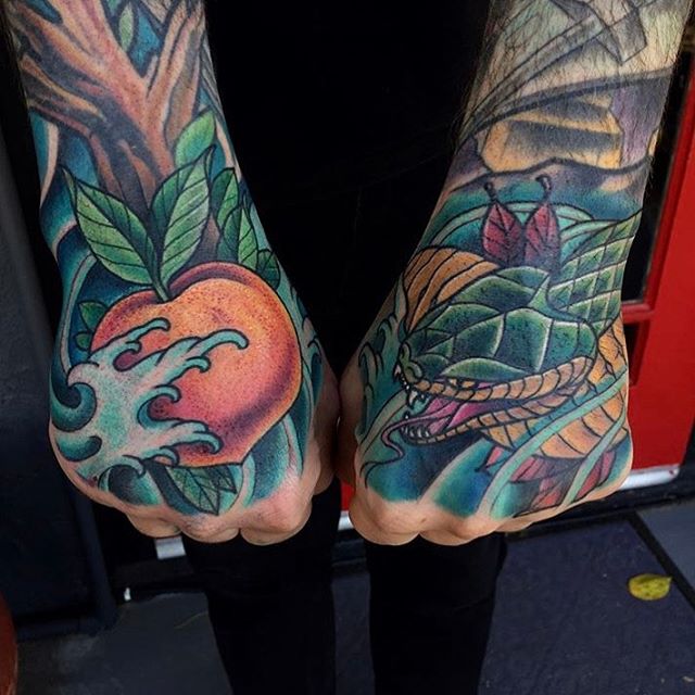 Set of hand tattoos by @terryribera #snaketattoo #peachtattoo #fruittattoo #handtattoo #handtattoos #tattooworkers #tattooist #sandiegotattooartist #sandiegotattoo #sandiegotattooshop #tattooistartmag #remingtontattoo